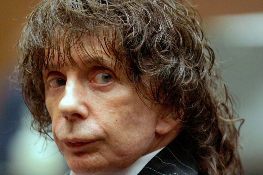 This July 29, 2008, file photo shows music producer Phil Spector during a hearing in Los Angeles County Superior Court. Opening statements are set for Wednesday, Oct. 29, 2008, in the murder retrial of Spector, who is accused of killing actress Lana Clarkson at his home in 2003. (AP Photo/Nick Ut) ORG XMIT: LA102