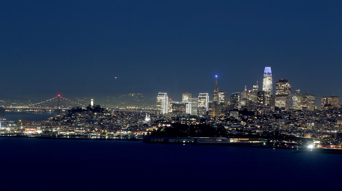 The glittering lights of the San Francisco skyline at nightfall  