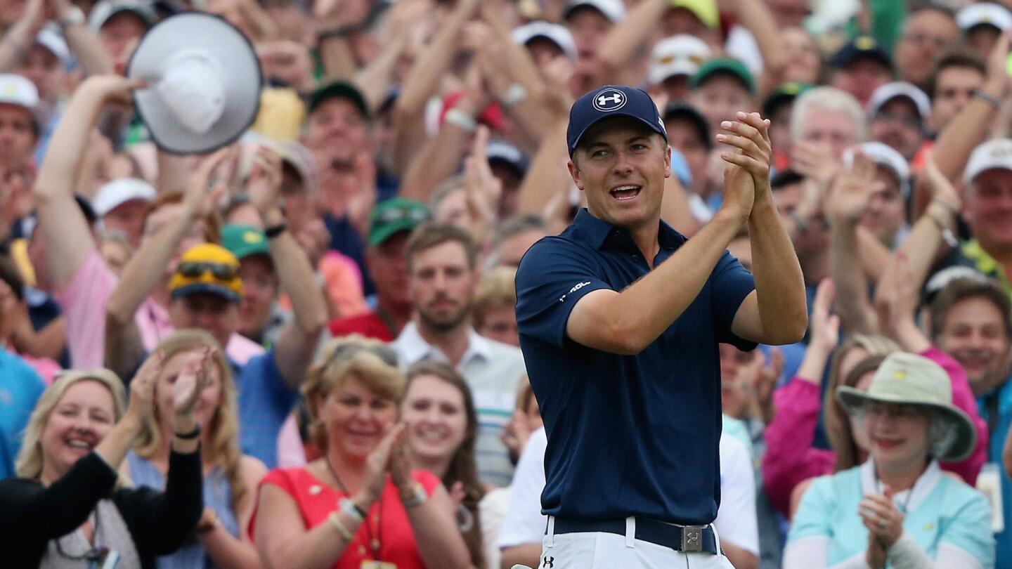 Jordan Spieth celebrates after winning the Masters at Augusta National Golf Club on April 12, 2015.