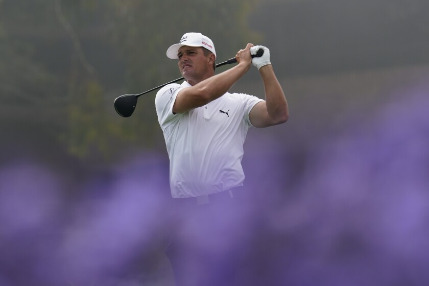 Bryson DeChambeau watches his tee shot on the 14th hole during a U.S. Open practice round at Torrey Pines.