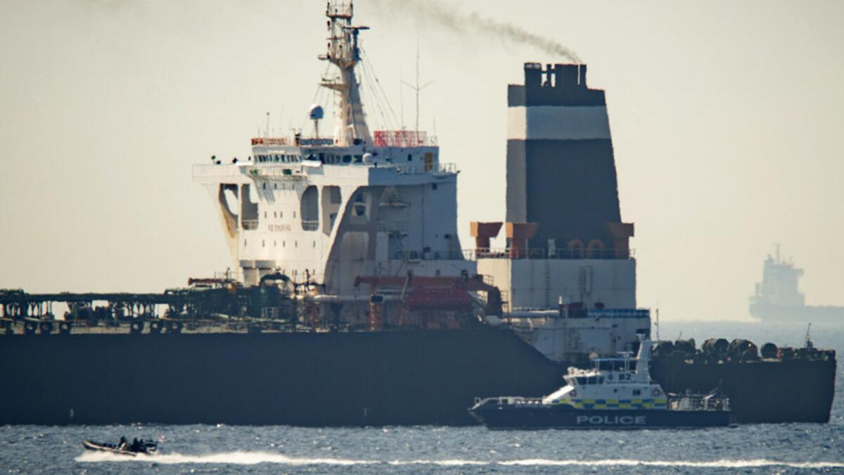 A Royal Marine patrol vessel cruises beside the Grace 1 supertanker seized by authorities in the British territory of Gibraltar on Thursday.