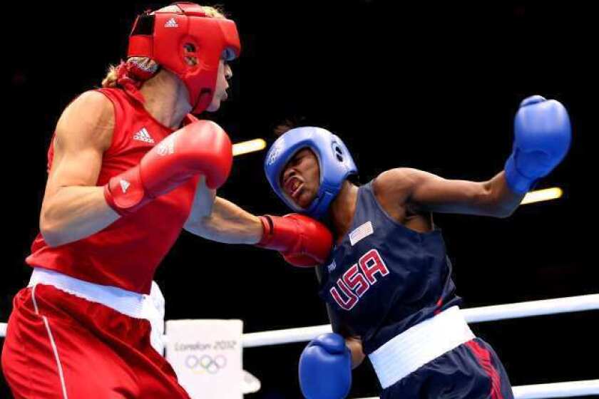 Claressa Shields of the U.S. competes against Anna Laurell of Sweden.