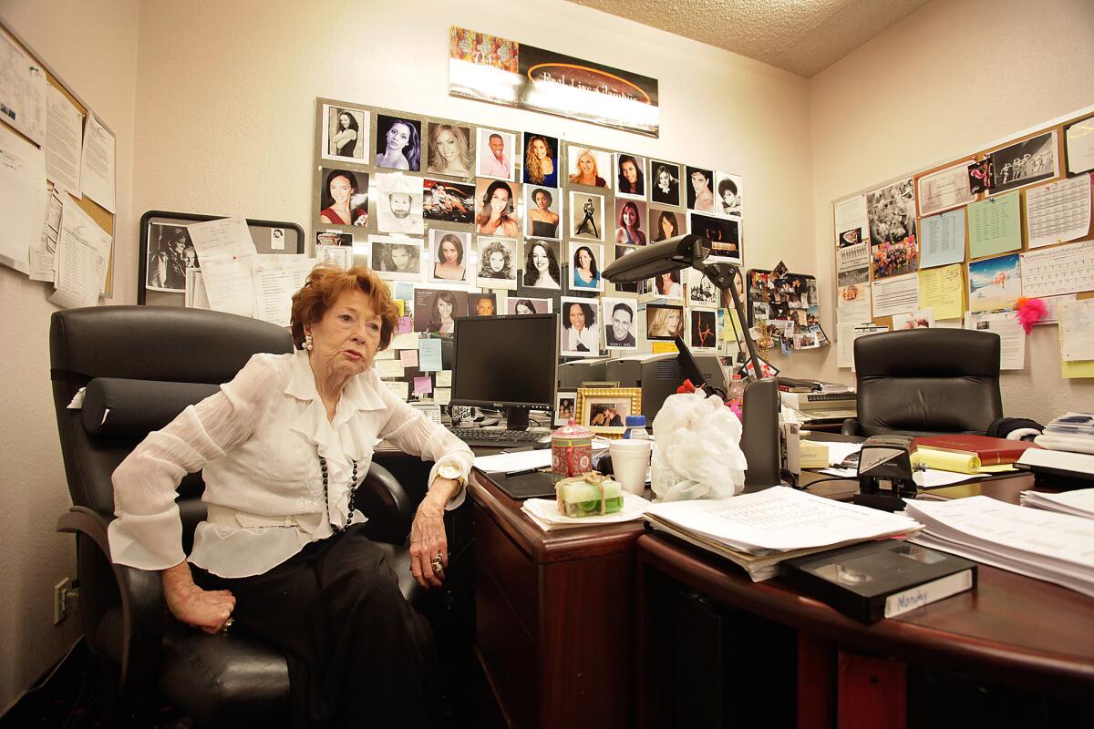 Fluff LeCoque, in a 2009 file photo in her Bally's office where she worked as a manager on the throwback Vegas show "Jubilee!" She died Dec. 10 at age 92.