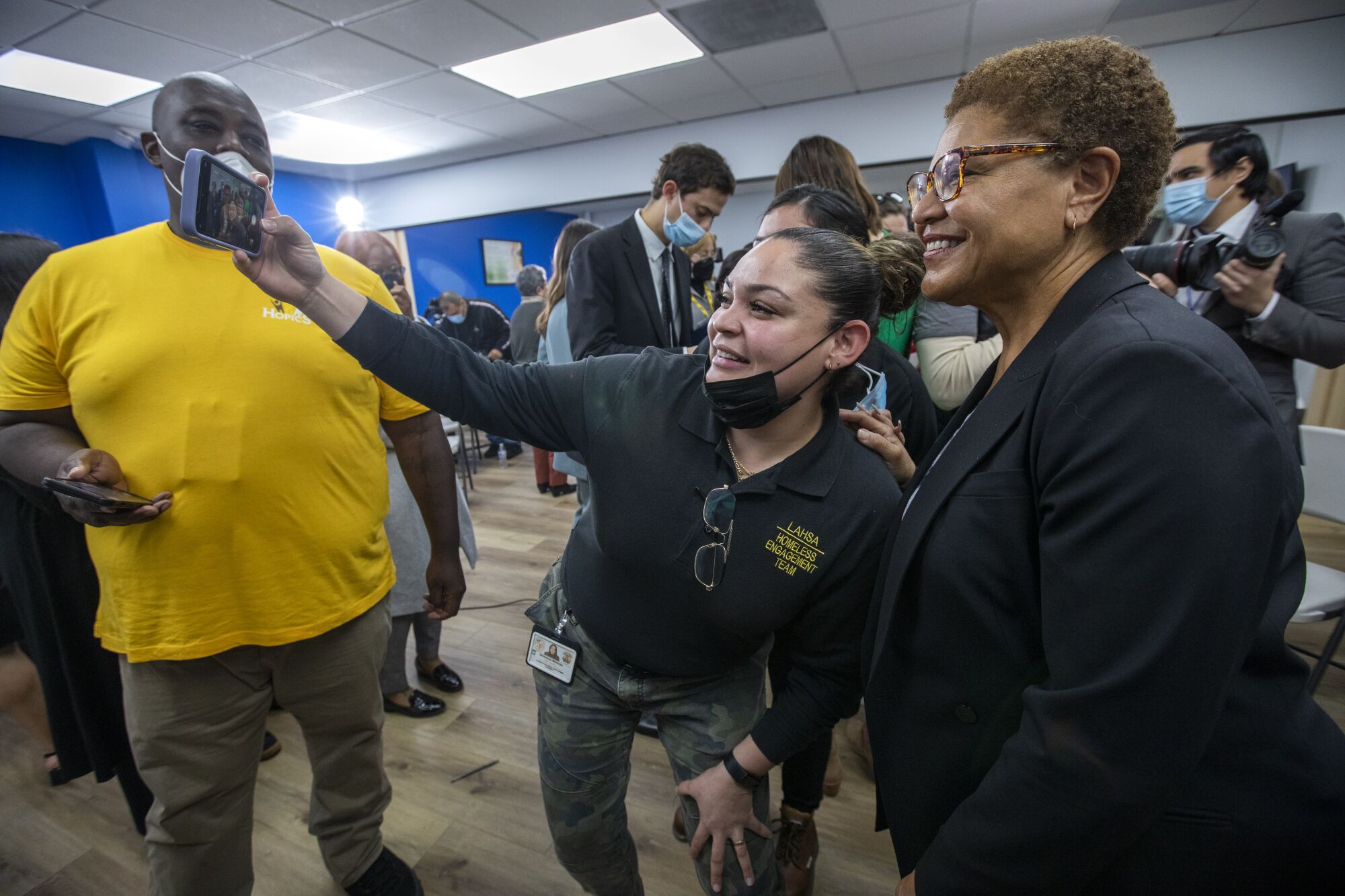 After the press conference workers from various local agencies took selfies with the new Mayor.