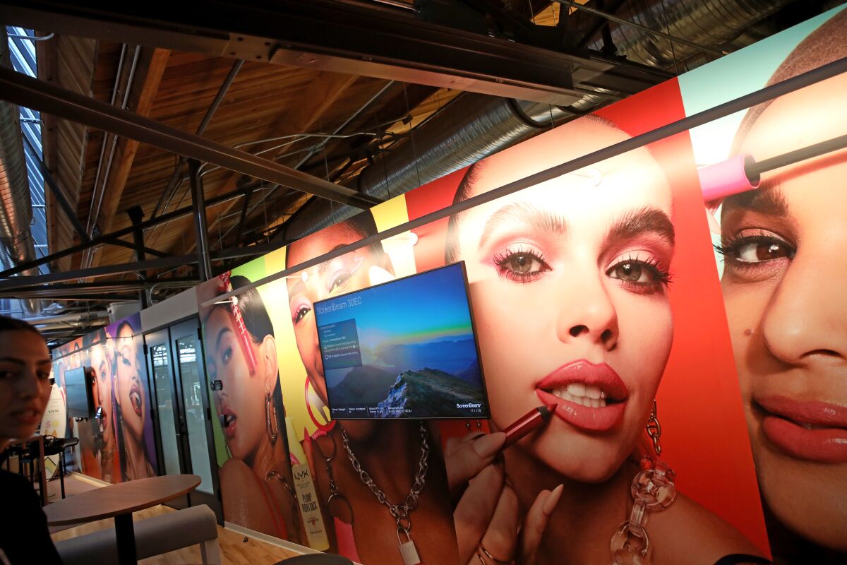 Company-themed art adorns a wall at L'Oréal's office.