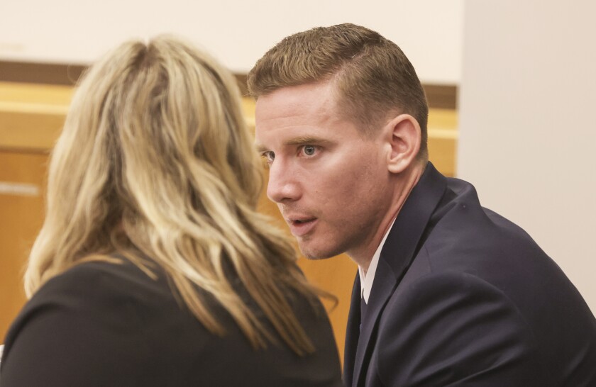 Matthew Dages (speaks with his lawyer Kasey Castillo during court hearing at the El Cajon courthouse on Tuesday. 
