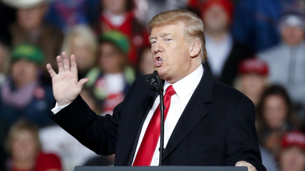 President Trump, seen here at a recent rally in Lebanon, Ohio, often refers to the investigation of Russian interference in the 2016 election in order to denounce it. Democrats, by contrast, seldom talk about it in their campaigns.