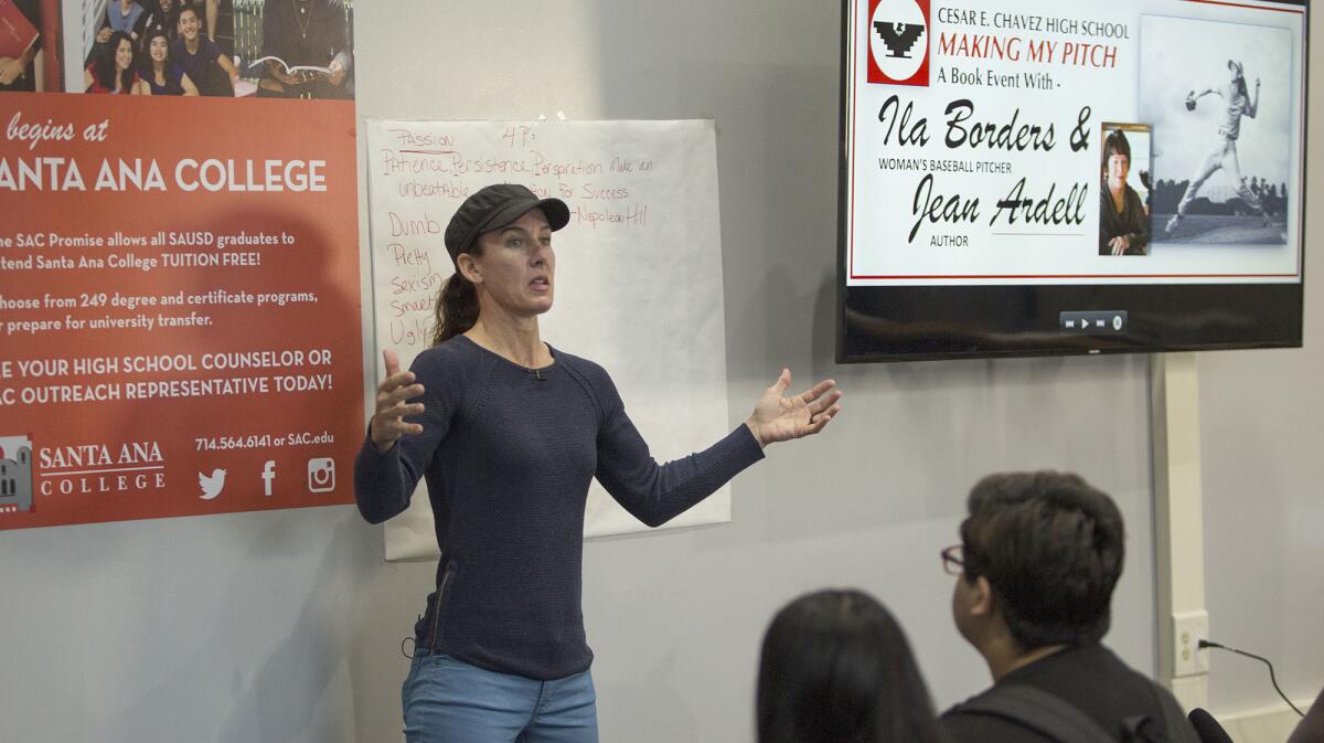 Ila Borders speaks to a group of students at Cesar Chavez High School in Santa Ana on Thursday. Borders is a former Vanguard University pitcher who was the only female pitcher to throw in college history. She was also a pitcher in the minor leagues.