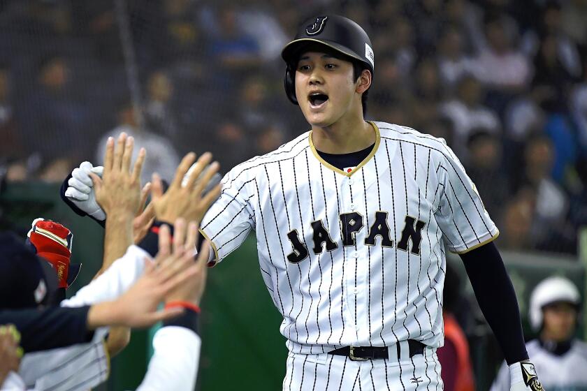 TOKYO, JAPAN - NOVEMBER 12: Shohei Ohtani #16 of Japan celebrates after hitting a solo homer.