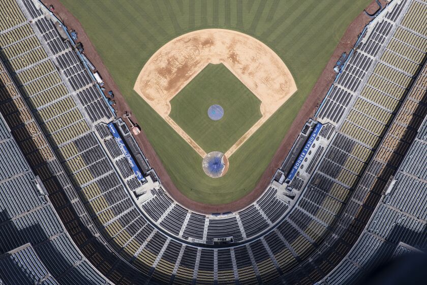 LOS ANGELES, CA, WEDNESDAY MARCH 25, 2020 - Aerial views of Dodger Stadium a day before the Major League season opening game was to be played. (Robert Gauthier/Los Angeles Times)