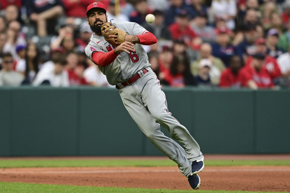 Angels third baseman Anthony Rendon throws to first base.