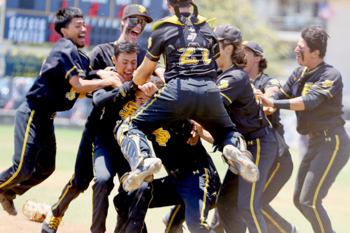 San Pedro players celebrate after defeating El Camino Real for the City Section Open Division title on Saturday.