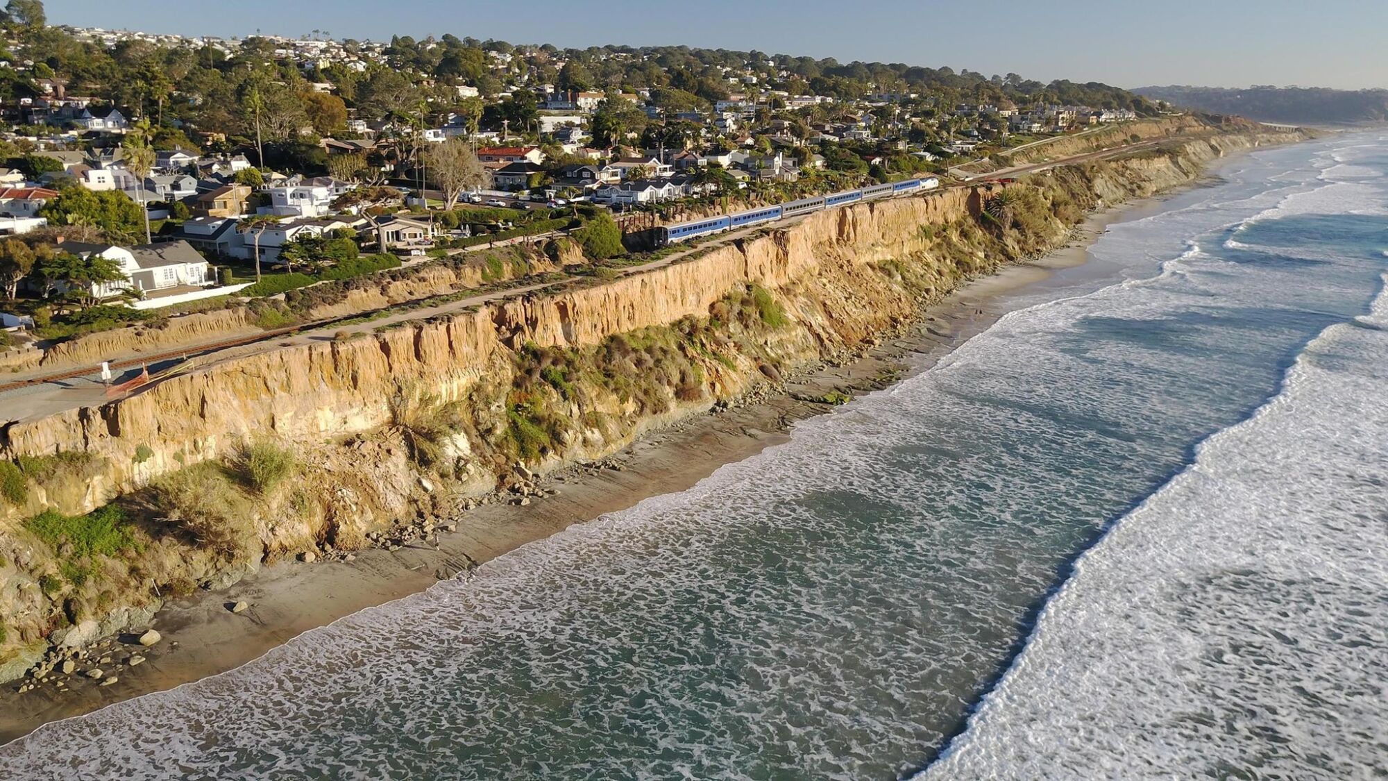 For the fourth time this year, the bluffs above the beach in Del Mar between 9th and 10th streets have sloughed off onto the beach below.