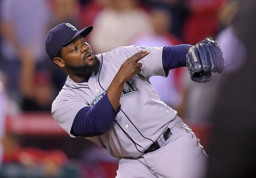Seattle Mariners relief pitcher Fernando Rodney gestures after they defeated the Los Angeles Angels 3-1 in a baseball game Monday, May 4, 2015, in Anaheim, Calif. (AP Photo/Mark J. Terrill)