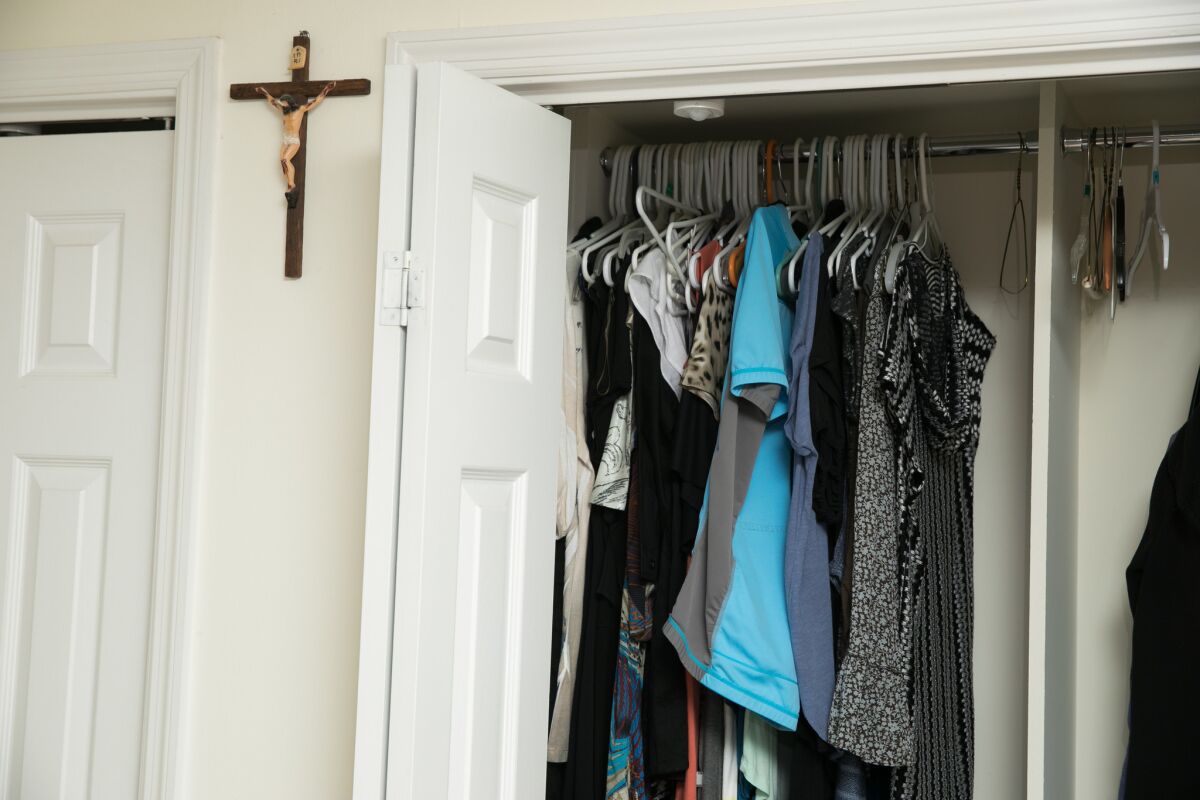 Cecilia's crucifix and some of her clothes remain in the bedroom of her home in Roswell, Ga.