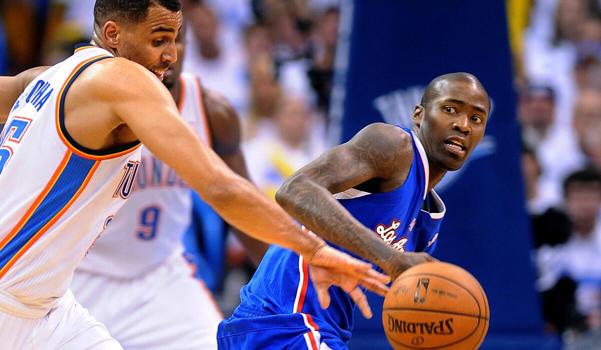 Thunder guard Thabo Sefolosha steals the ball from Clippers guard Jamal Crawford.