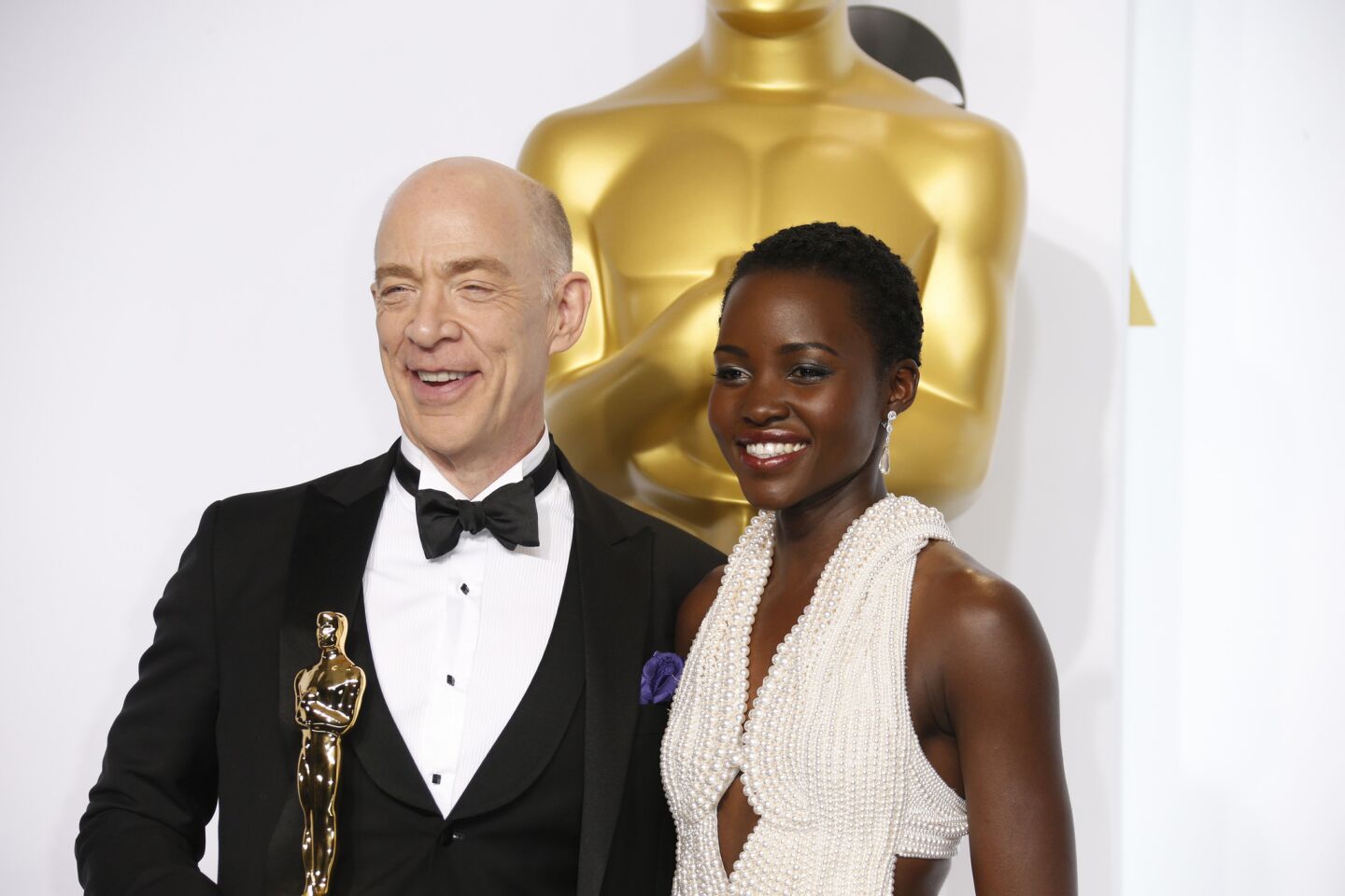 Oscars 2015 winners' room | J.K. Simmons and presenter Lupita Nyong'o