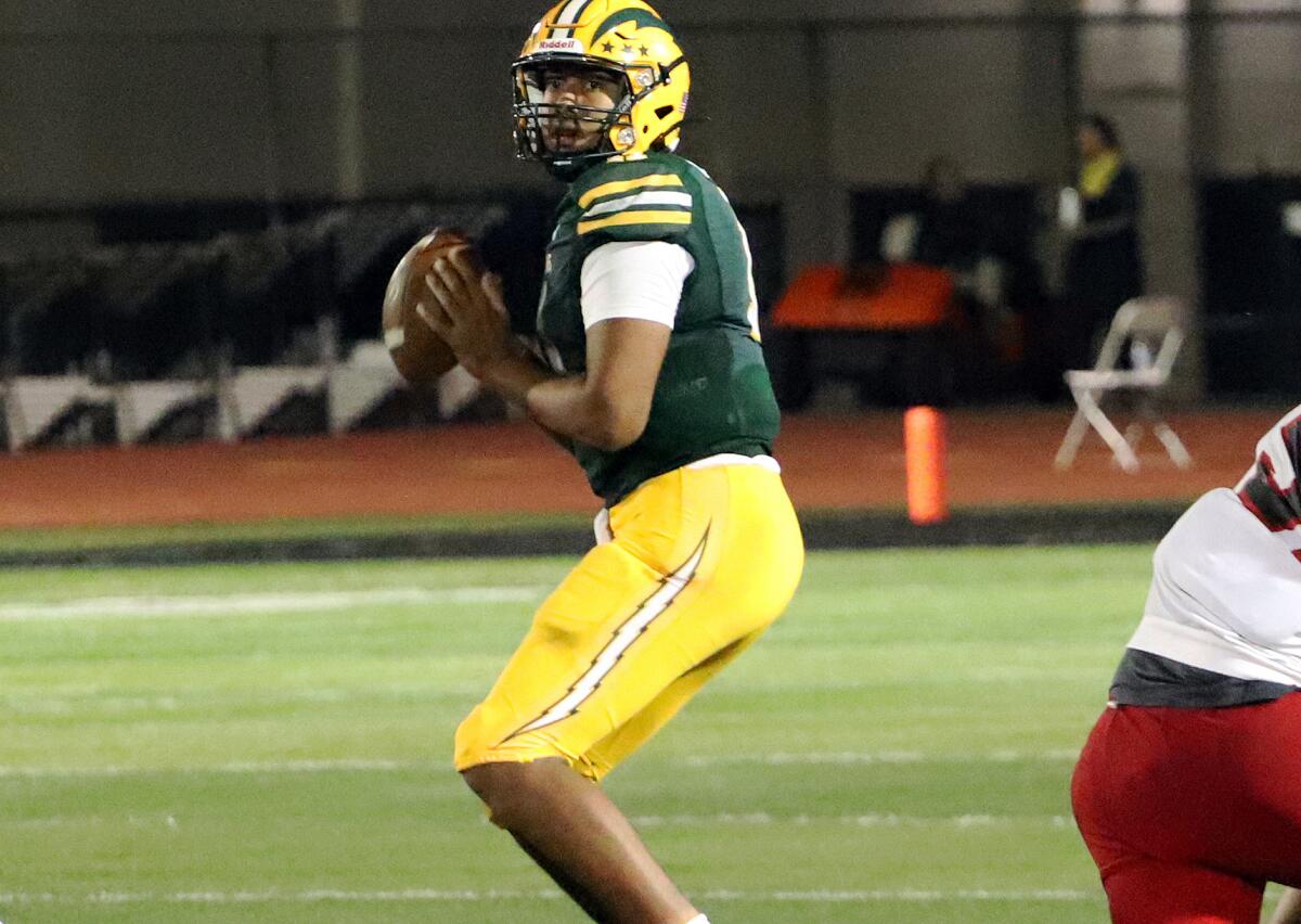 Edison quarterback Savelio Niumata (11) drops back to pass against Palos Verdes in a nonleague game on Friday.