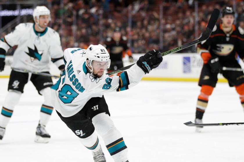 San Jose Sharks' Melker Karlsson, of Sweden, follows through on a shot that scored during the third period of the team's NHL hockey game against the Anaheim Ducks on Sunday, Jan. 21, 2018, in Anaheim, Calif. The Sharks won 6-2. (AP Photo/Jae C. Hong)
