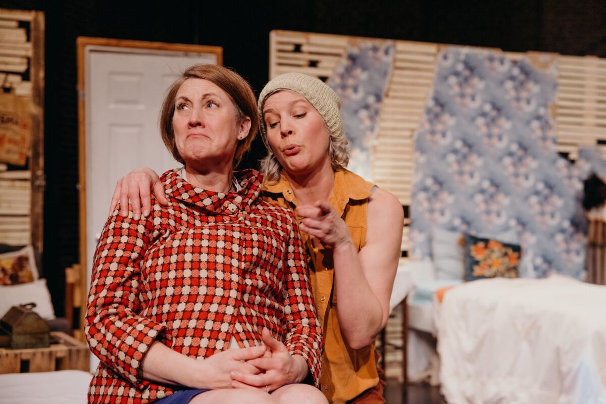 Two actors onstage.