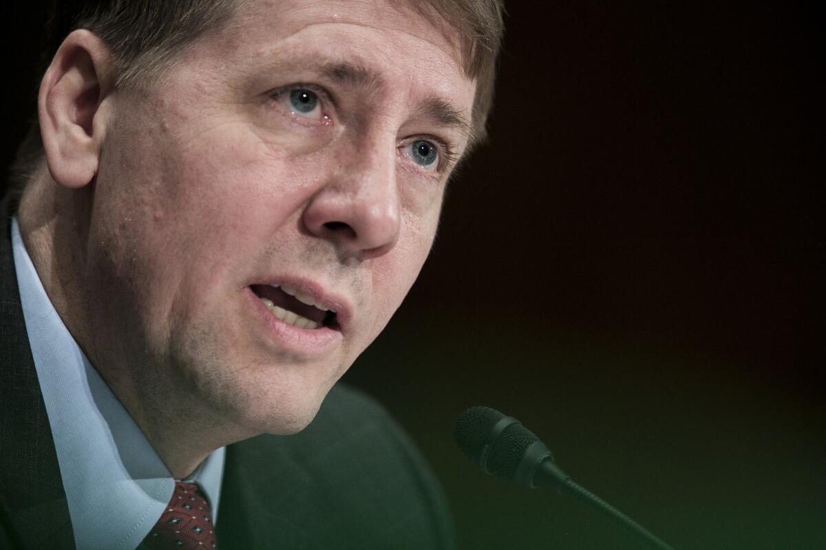 Richard Cordray, director of the Consumer Financial Protection Bureau, testifies before Congress in 2013. A study by the bureau found arbitration clauses in credit card and checking account agreements harm consumers.