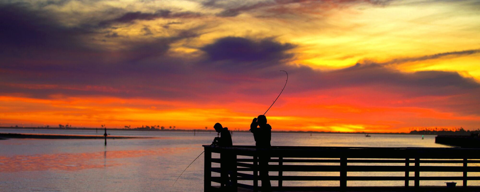 Pier fishermen take advantage of the recent beautiful weather in San Diego.