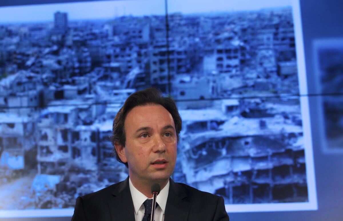 Syrian National Coalition President Khaled Khoja speaks in August at a news conference in Moscow after talks with Russian Foreign Minister Sergei Lavrov. Khoja said that "the Russian leadership isn’t clinging to Bashar Assad."