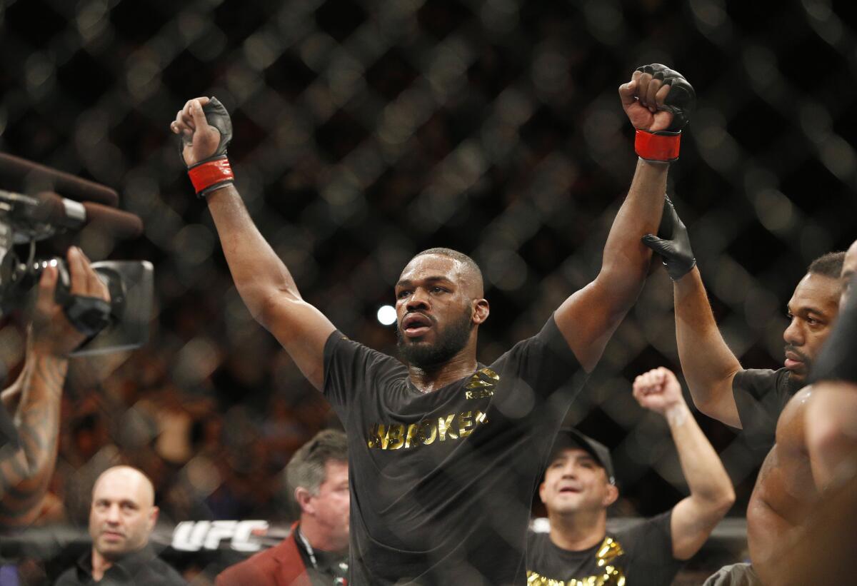 UFC light-heavyweight champion Jon Jones celebrates after beating Daniel Cormier in a title fight at UFC 182 on Jan. 3 in Las Vegas. It was later revealed that Jones tested positive for cocaine a month before his fight.