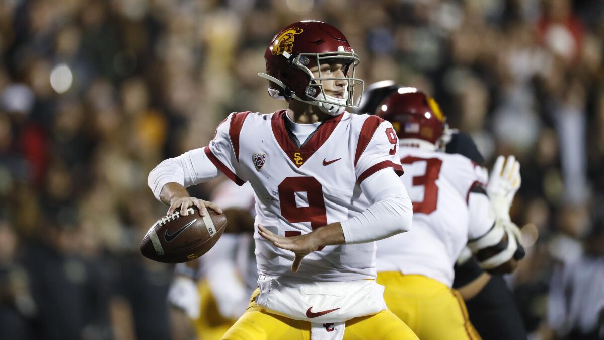 USC quarterback Kedon Slovis looks to throw in the second half against Colorado on Friday in Boulder, Colo. USC won 35-31.