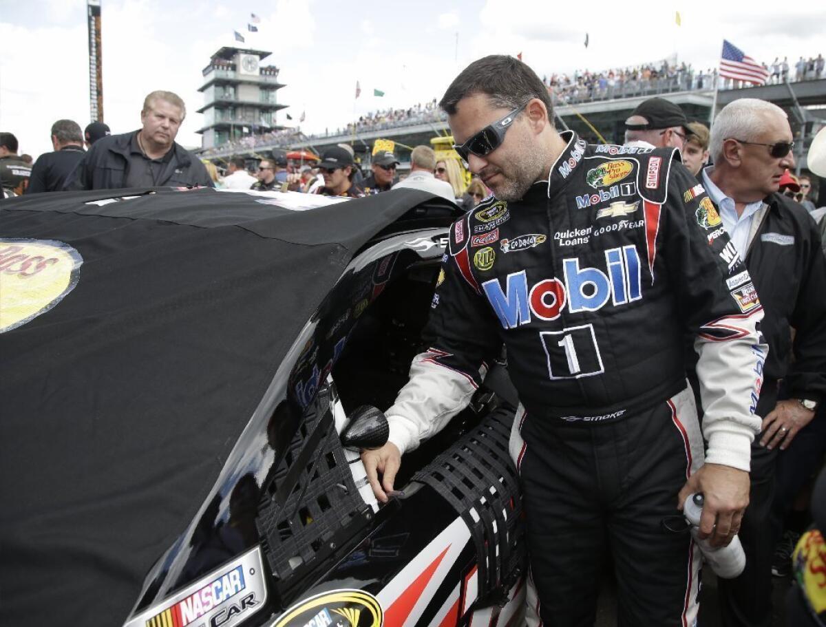 Sprint Cup Series driver Tony Stewart prepares for a race July 28.
