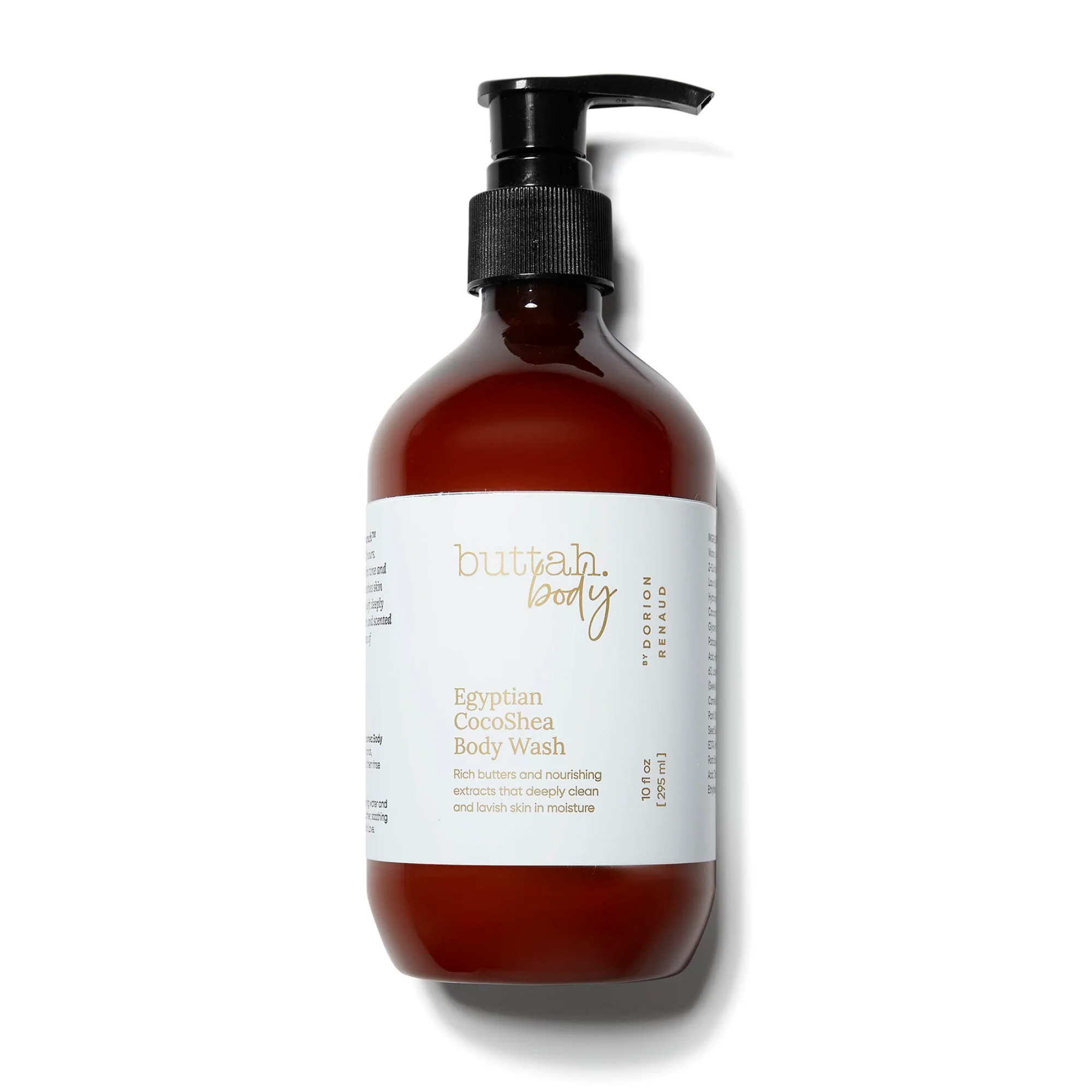 a Buttah Skincare Egyptian CocoShea Body Wash amber bottle with a white label lying on its side on a white background