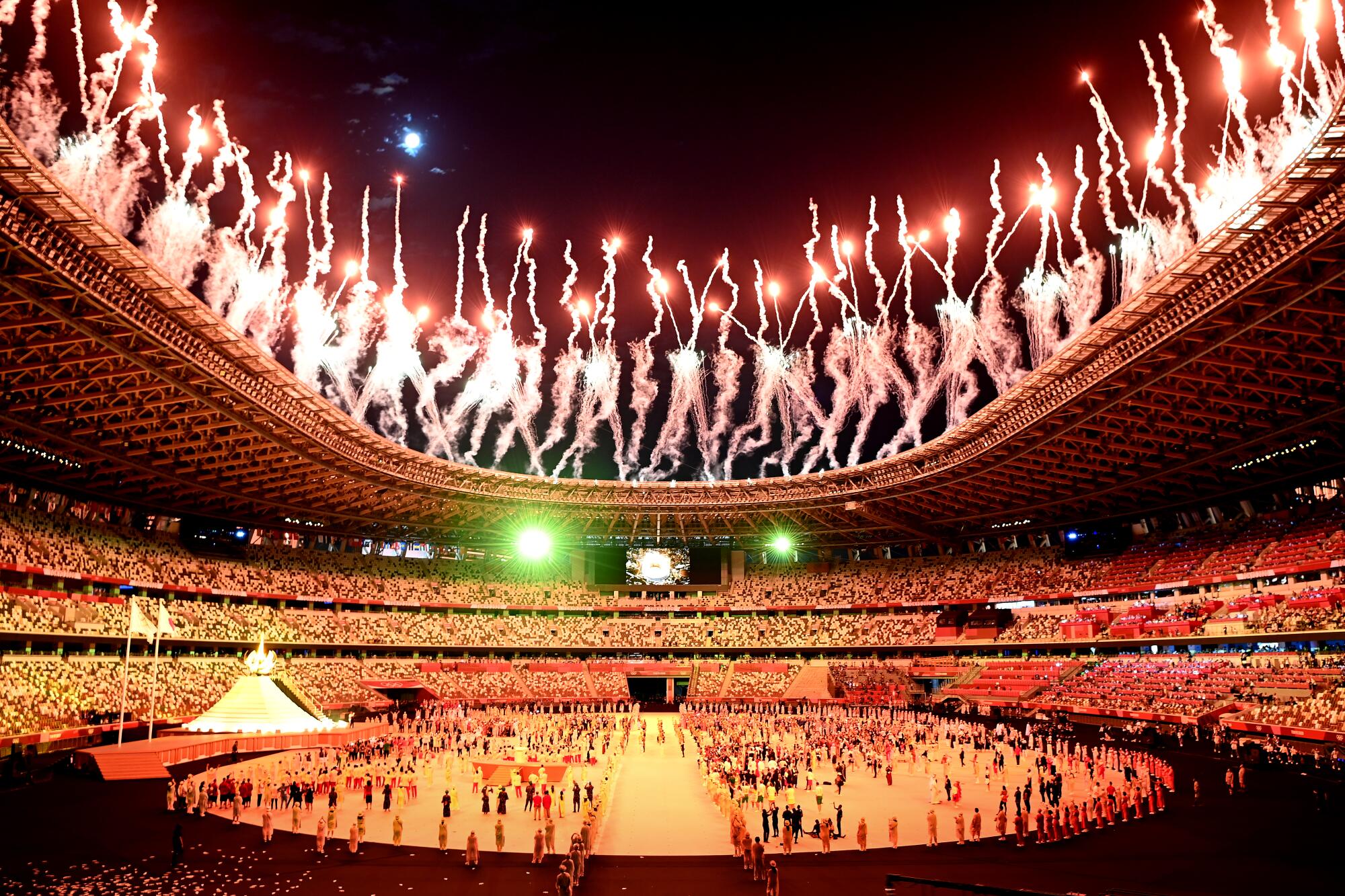 Fireworks light the sky during opening ceremonies at the Tokyo Olympics.