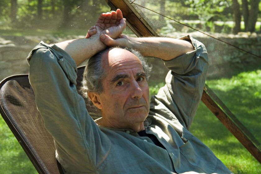 Novelist Philip Roth, 72, sits inside a screened tent at his home Sept. 5, 2005 in Warren Conn. Roth's complete works will be published by the Library of America, with the first two volumes out in fall 2005. (AP Photo/Douglas Healey). ORG XMIT: NY330
