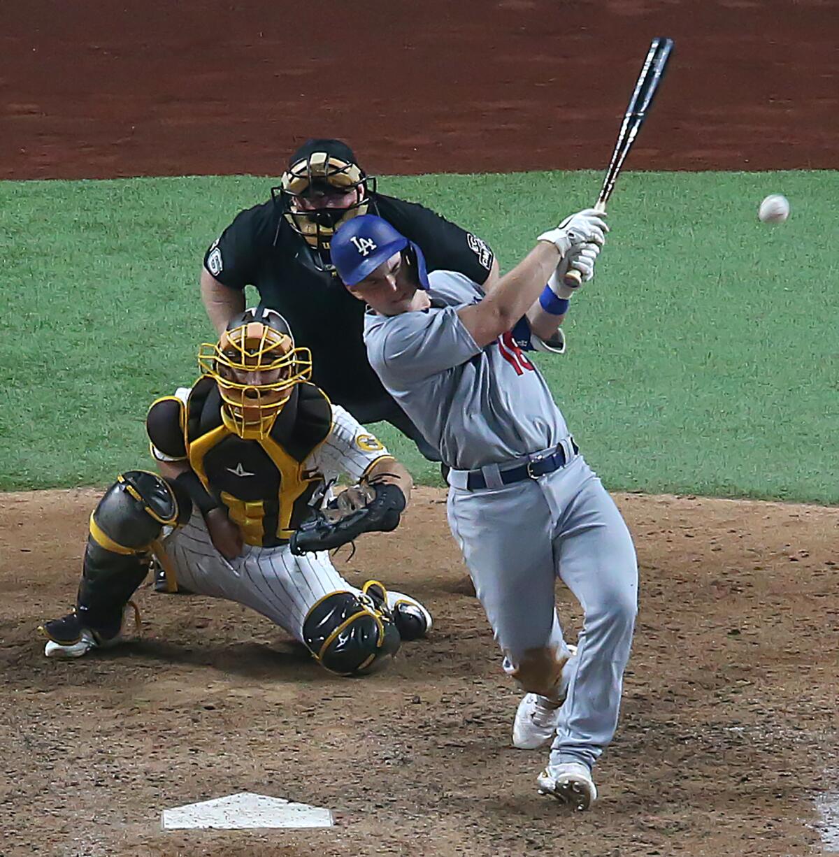 Will Smith bats against the Padres in Game 3.