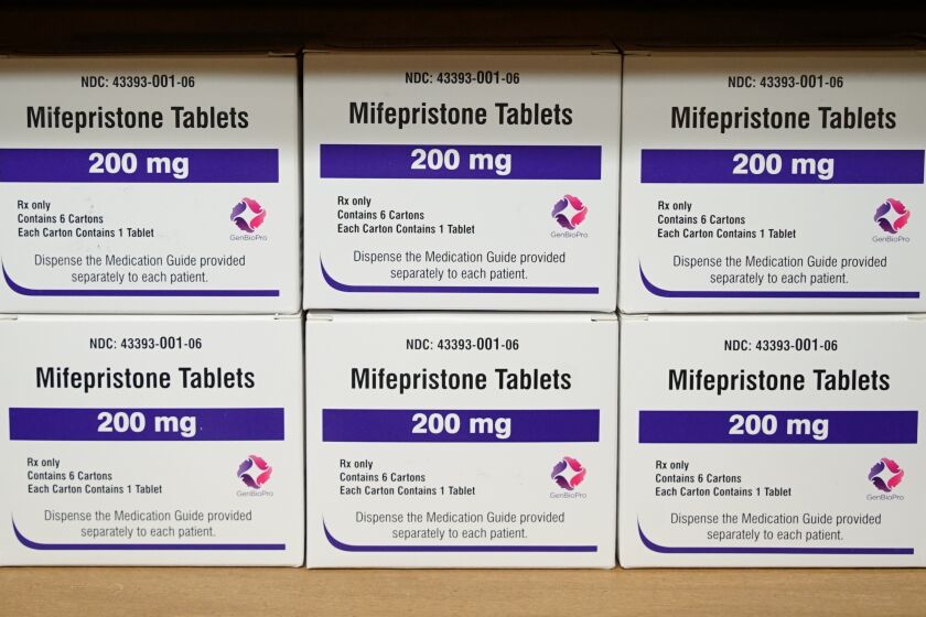 FILE - Boxes of the drug mifepristone sit on a shelf at the West Alabama Women's Center in Tuscaloosa, Ala., on March 16, 2022. Lawsuits have been filed in West Virginia and North Carolina challenging the states' restrictions on the use of abortion pills. (AP Photo/Allen G. Breed, File)