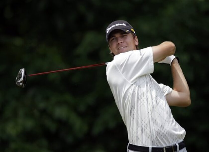 Sean O'Hair watches his tee shot on the third hole during the final round of the Quail Hollow Championship golf tournament at the Quail Hollow Club in Charlotte, N.C., Sunday, May 3, 2009. (AP Photo/Nell Redmond)