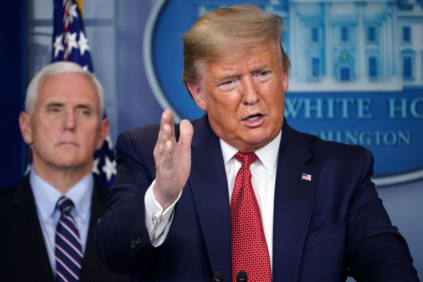 US President Donald Trump speaks during a press conference on the COVID-19, coronavirus, outbreak flanked by US Vice President Mike Pence at the White House in Washington, DC on March 25, 2020. - The number of novel coronavirus cases in the world rose to 85,919, including 2,941 deaths, across 61 countries and territories by 1700 GMT on Saturday, according to a report gathered by AFP from official sources. (Photo by MANDEL NGAN / AFP) (Photo by MANDEL NGAN/AFP via Getty Images)