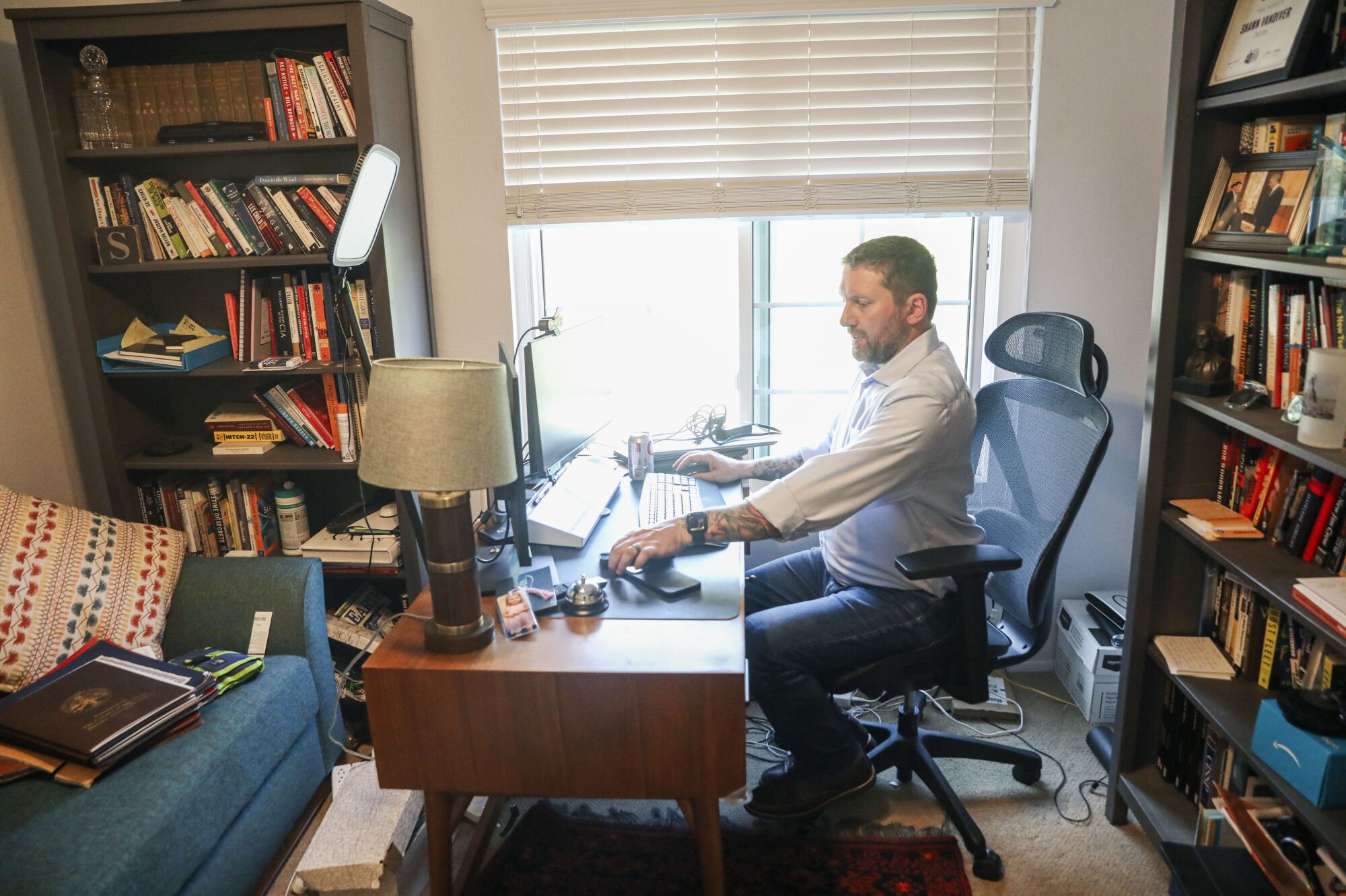 Shawn VanDiver works from his home office in Clairemont.