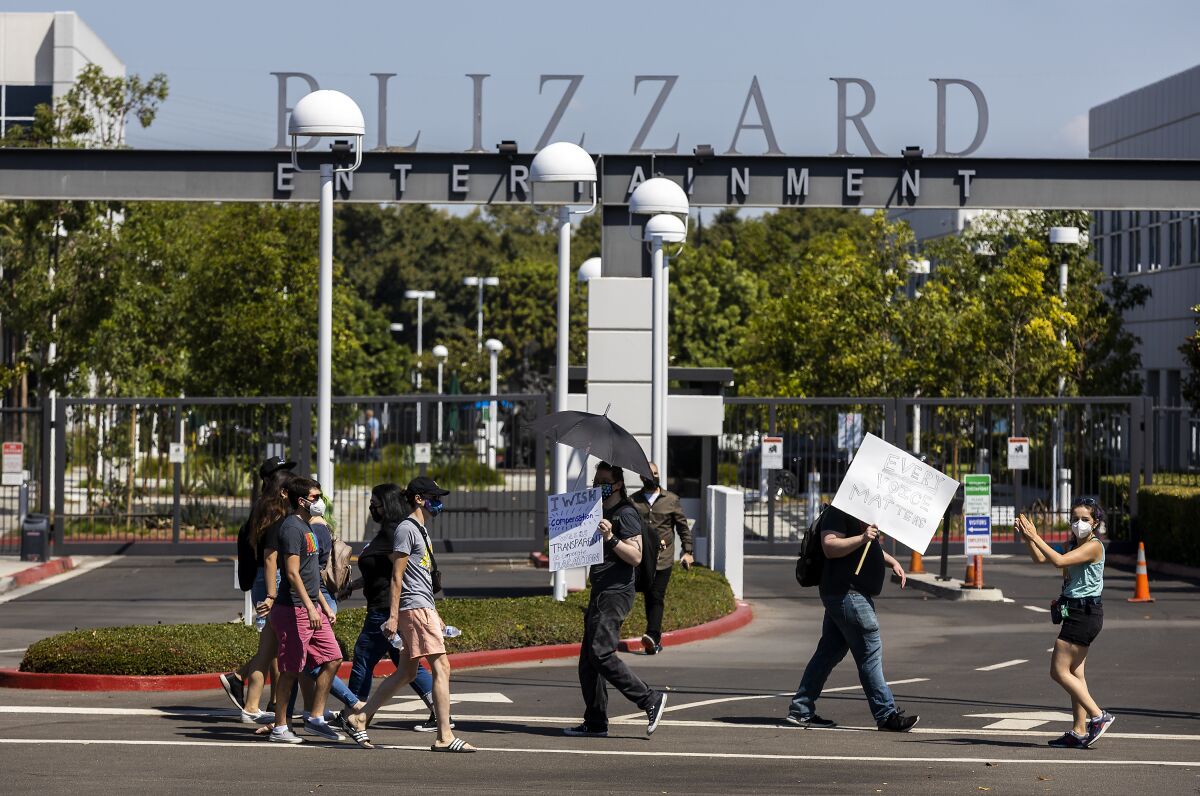 Several hundred Activision Blizzard employees stage a walkout at the company's Irvine office.