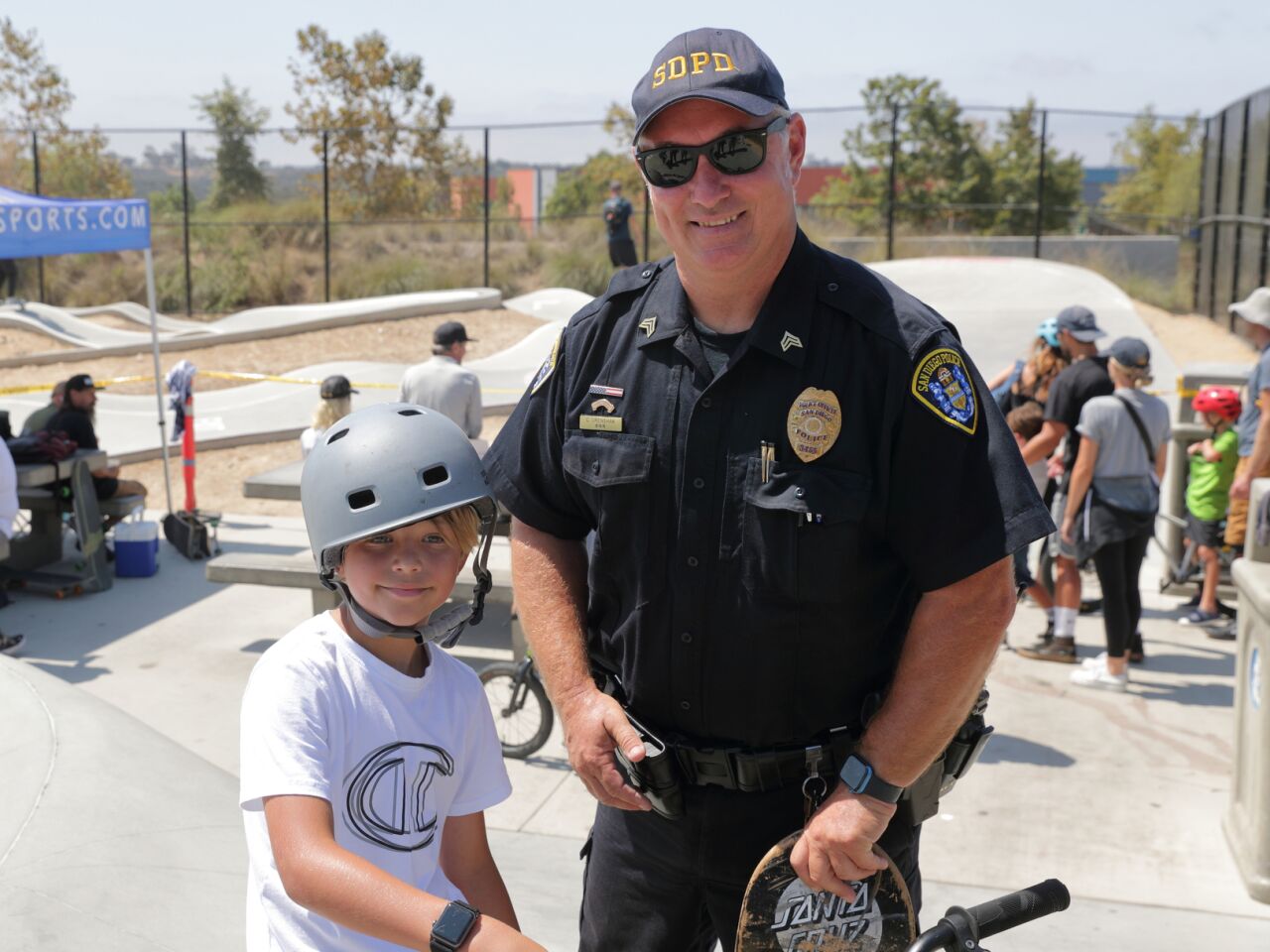 Levi Gayet with SDPD Officer Chad Crenshaw
