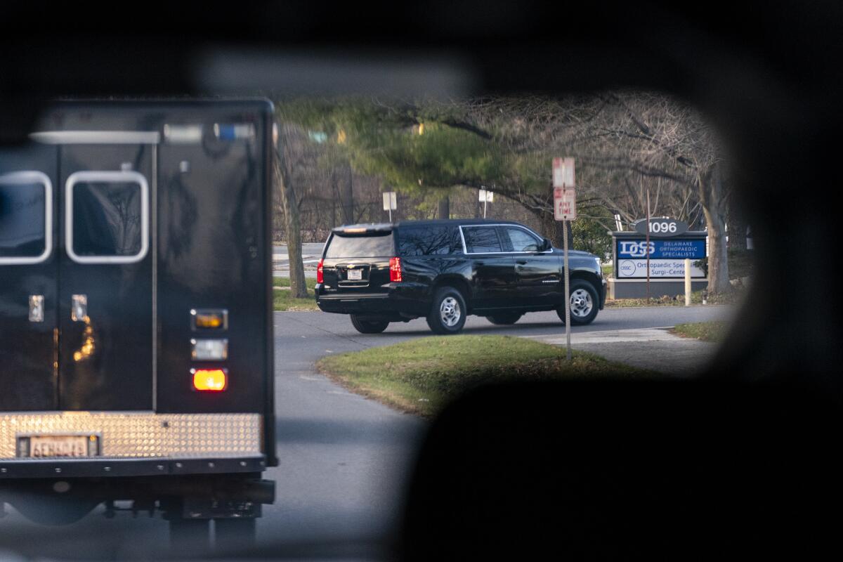 A motorcade with President-elect Joe Biden aboard arrives at Delaware Orthopaedic Specialists in Newark, Del.