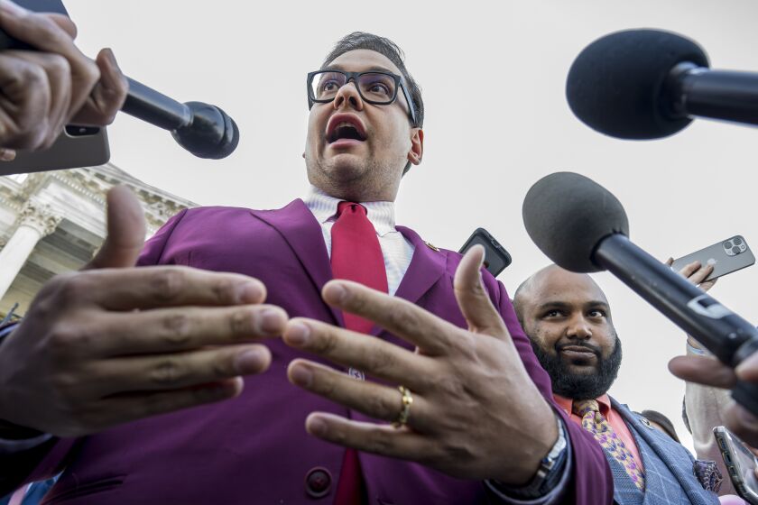 FILE — Rep. George Santos, R-N.Y., speaks to reporters outside after an effort to expel him from the House, at the Capitol in Washington, May 17, 2023. A federal magistrate ruled Tuesday, June 6, 2023, to make public the names of the cosigners on indicted Rep. George Santos' $500,000 release bond, but said she'll keep them secret for now to give his lawyer time to appeal the decision. (AP Photo/J. Scott Applewhite, File)