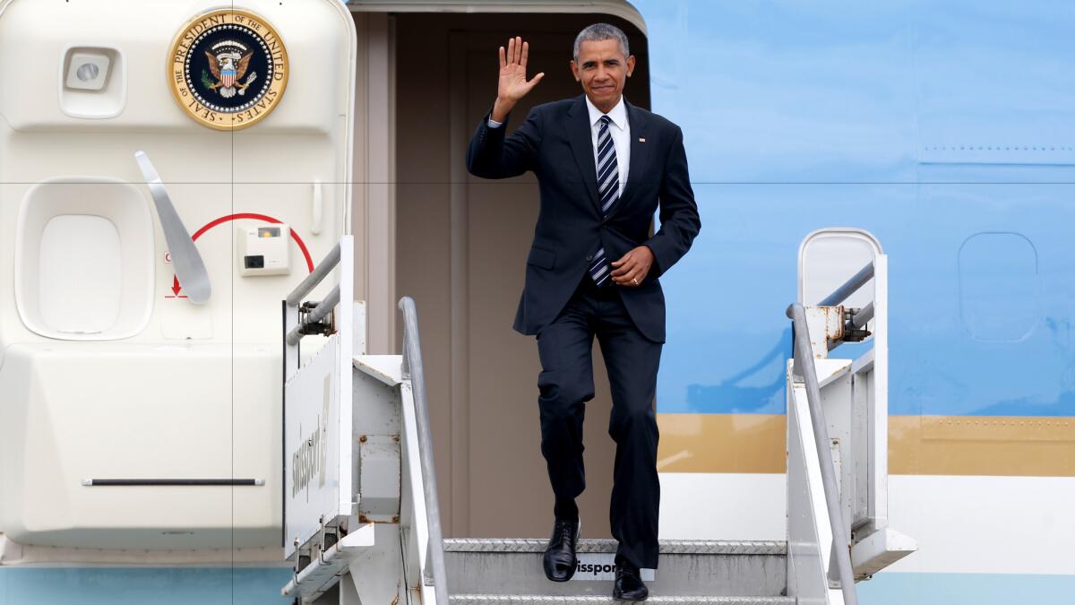 President Obama arrives at Los Angeles International Airport on Oct. 24, 2016. The president is in town for a Hollywood fundraiser. He met on the tarmac with Mayor Eric Garcetti and County Supervisor Mark Ridley-Thomas.