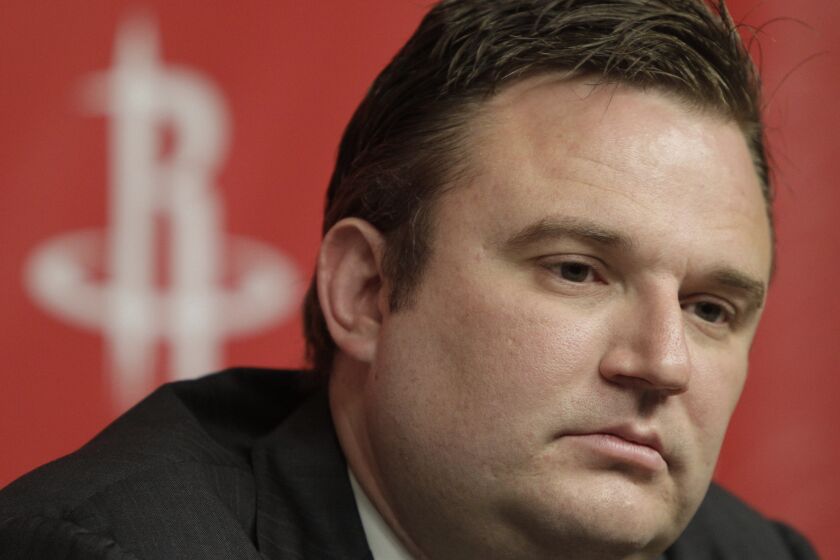 FILE - In this April 19, 2011, file photo, Houston Rockets general manager Daryl Morey discusses the direction of the team with the media during a basketball news conference, in Houston, after the decision to part ways with NBA basketball head coach Rick Adelman. Morey tried Sunday, Oct. 6, 2019 to defuse the rapidly growing fallout over his deleted tweet that showed support for Hong Kong anti-government protesters, saying he did not intend to offend any of the team's Chinese fans or sponsors. (AP Photo/Pat Sullivan, File)