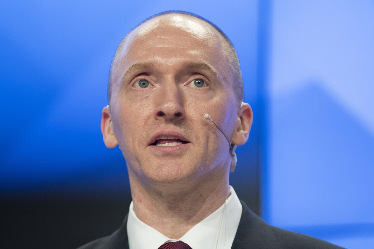 Carter Page, speaking here at a news conference at RIA Novosti news agency in Moscow, Russia, met with a retired American professor who was a secret informant for the FBI in July 2016.