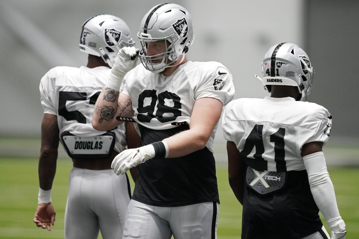 Raiders' Maxx Crosby back to work after stint on COVID list - The