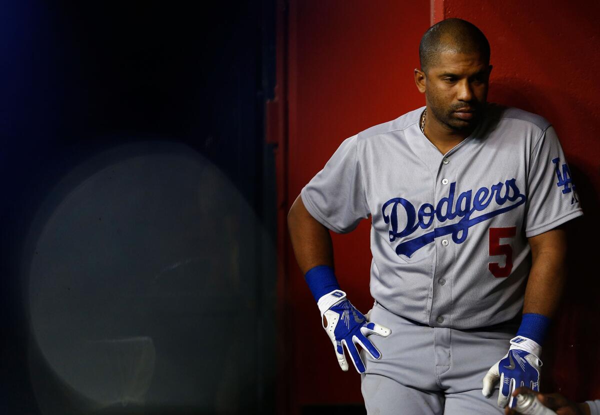 Dodgers third baseman Alberto Callaspo was designated for assignment after the team's acquisition of second baseman Chase Utley.