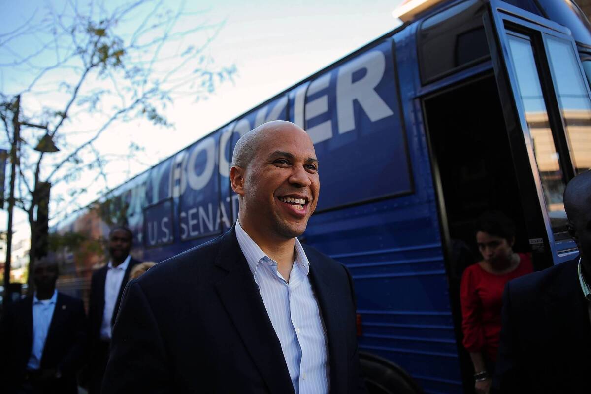 Mayor Cory Booker campaigns in downtown Newark, N.J., for Wednesday's special U.S. Senate election. The Democrat has pledged not to be a partisan politician in Washington.