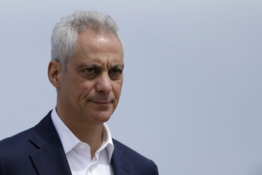 FILE - In this April 22, 2019, file photo, Chicago Mayor Rahm Emanuel waves as he arrives at a news conference outside of the south air traffic control tower at O'Hare International Airport in Chicago. (AP Photo/Kiichiro Sato, File)