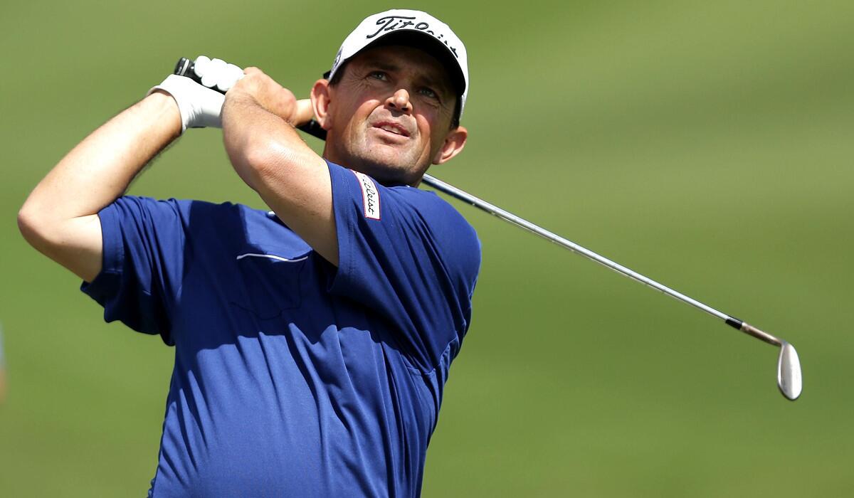 Greg Chalmers watches his approach at No. 13 during the second round of the Australian Open on Friday.